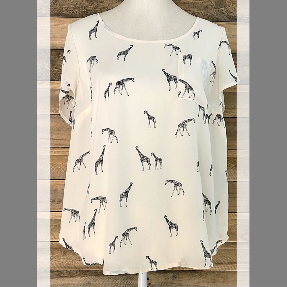 Torrid giraffe print semi sheer button back top